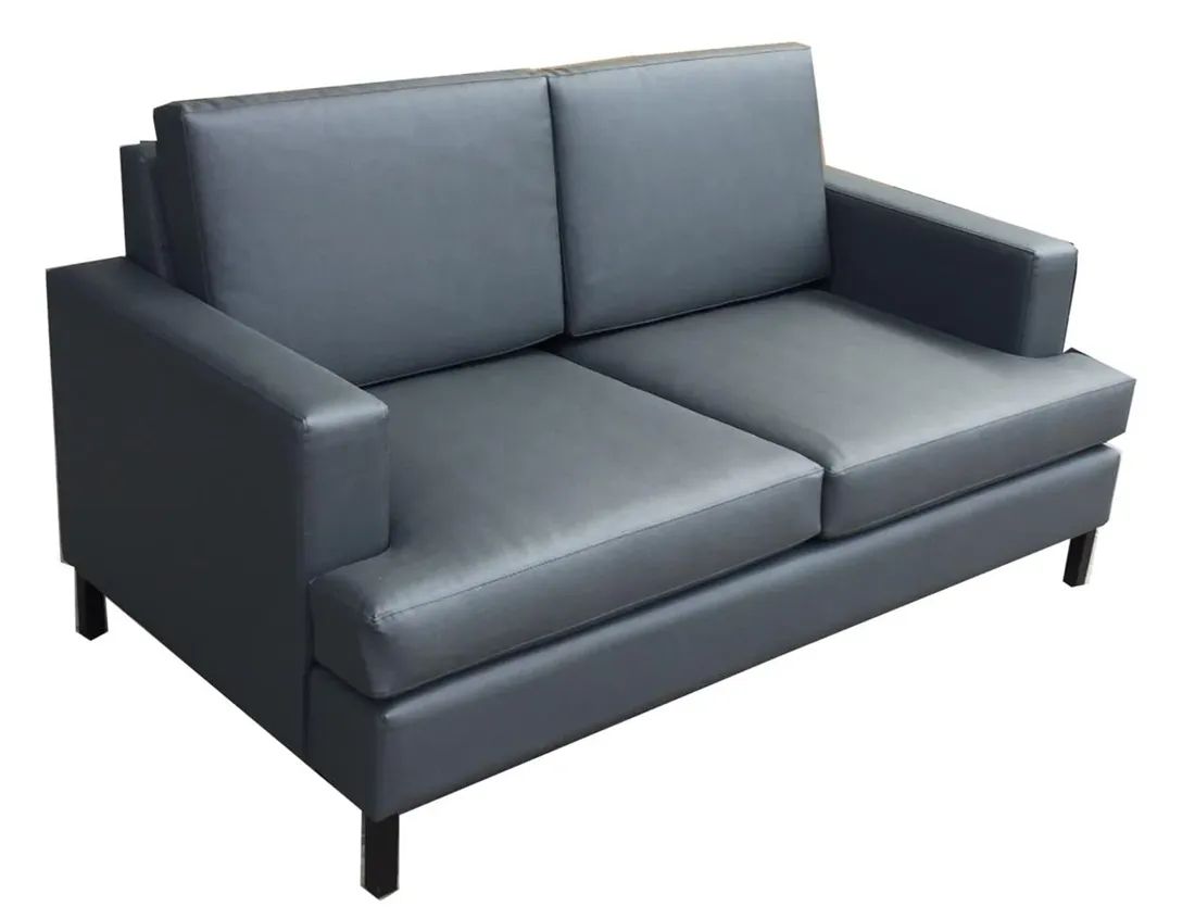 Upholstered love seat for a lounge space